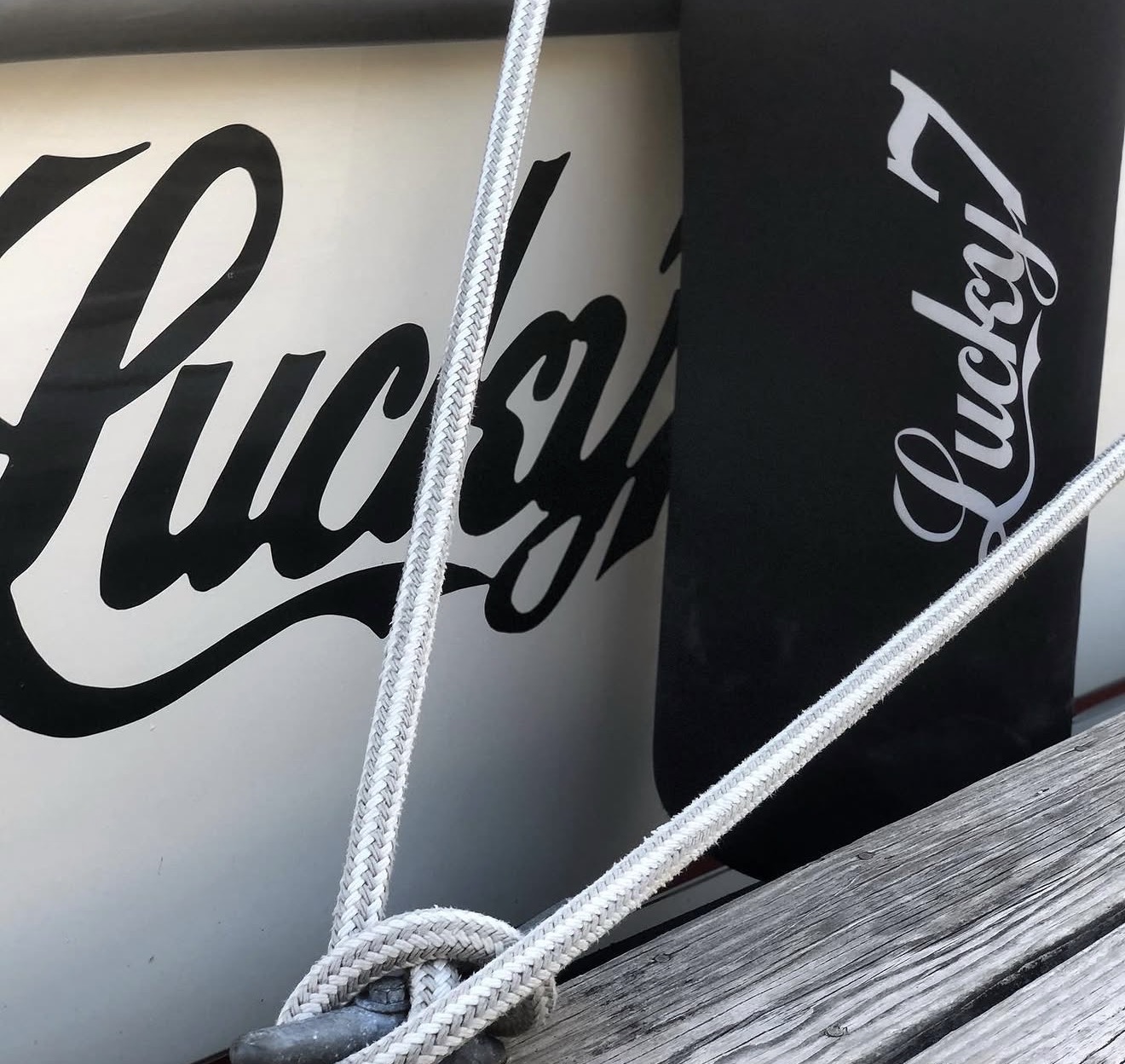 Lucky 7 custom black and white boat name fender covers