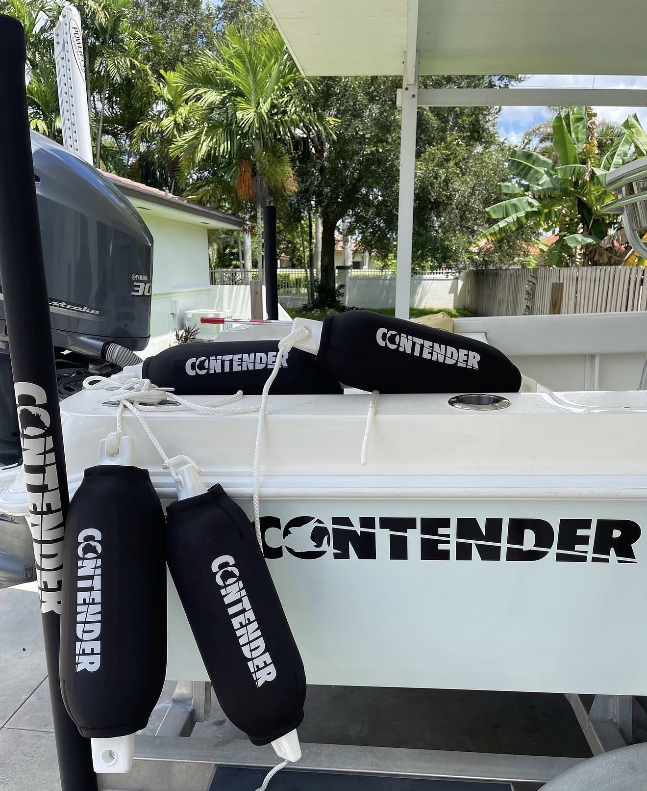 Contender branded custom neoprene fender cover on boat
