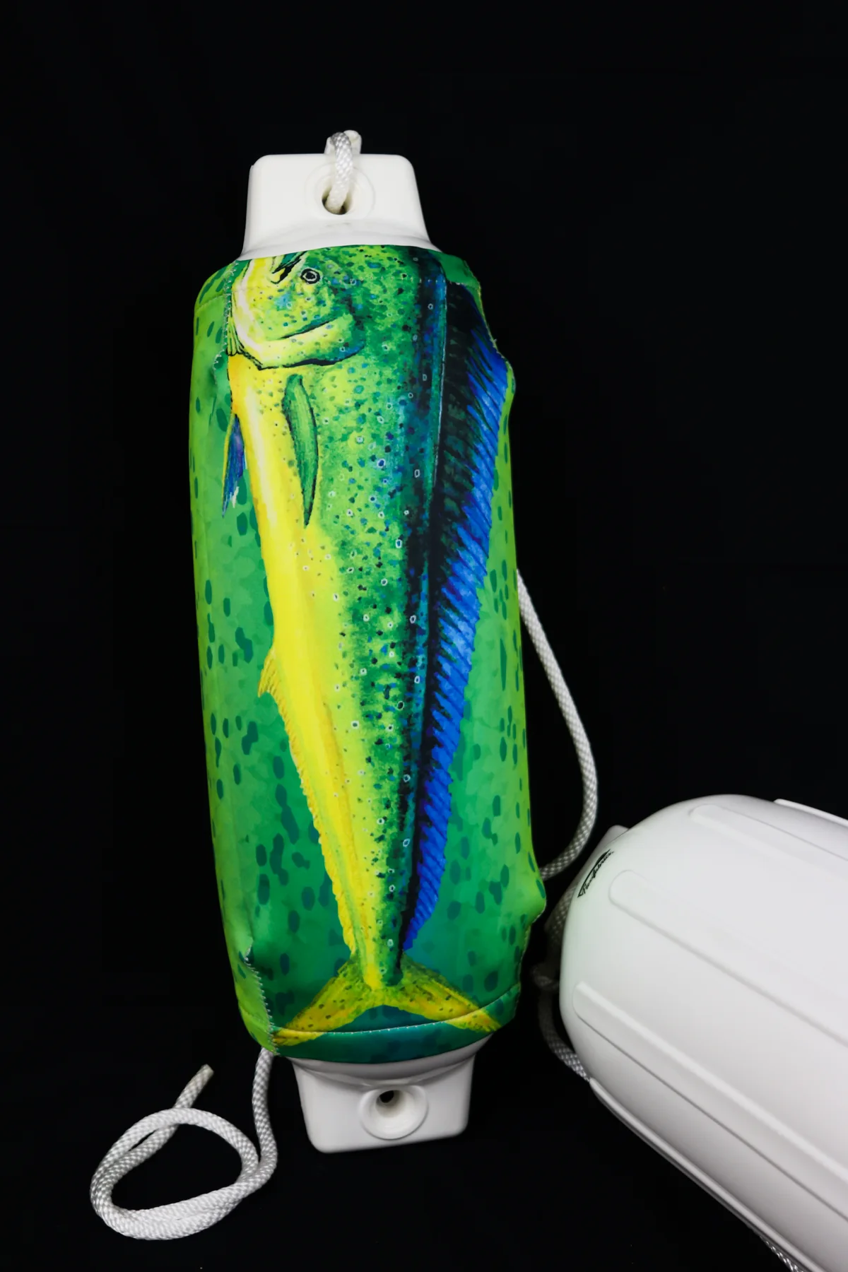 Bright green mahi-mahi custom FenderSox displayed beside its white fender
