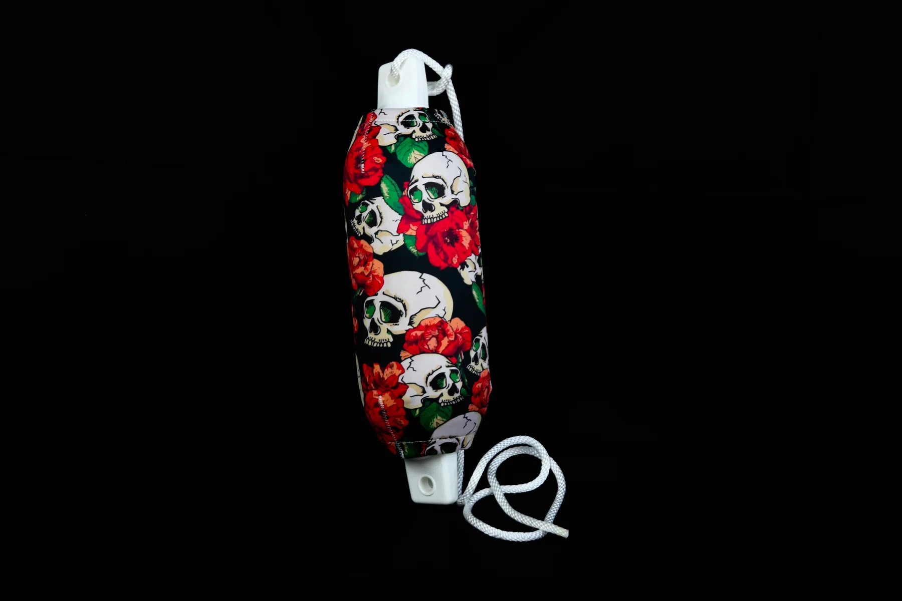 Skulls and red roses custom FenderSox photographed horizontally in the studio